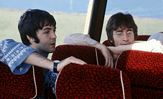 John and Paul on the Magical Mystery Tour bus